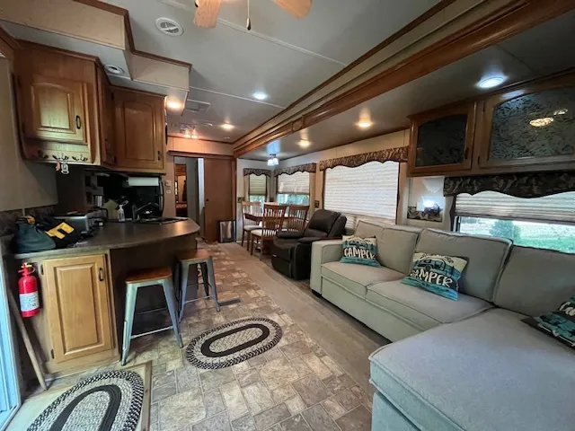 a bed room with bed and mirror