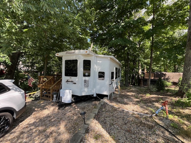 2795 East 28th Road Marseilles, IL 61341 - Photo 2 of 73 a front view of a house with a garden