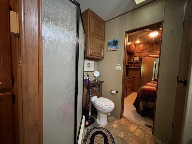 2795 East 28th Road Marseilles, IL 61341 - Photo 25 of 73 a bathroom with a toilet sink and mirror