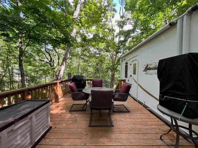 a view of a balcony with chairs
