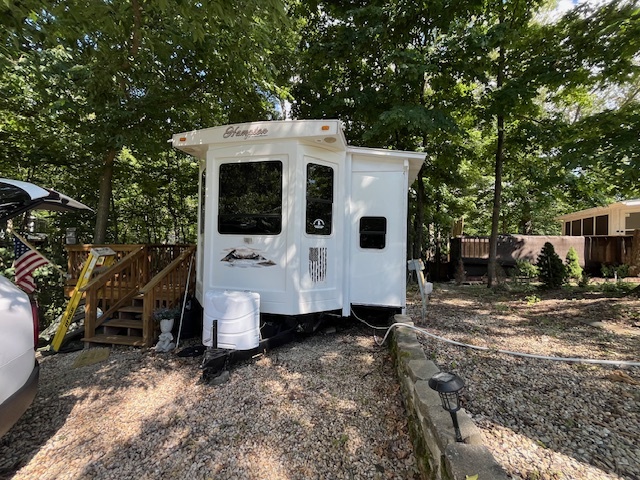 2795 East 28th Road Marseilles, IL 61341 - Photo 5 of 73 a view of a white house with a large tree