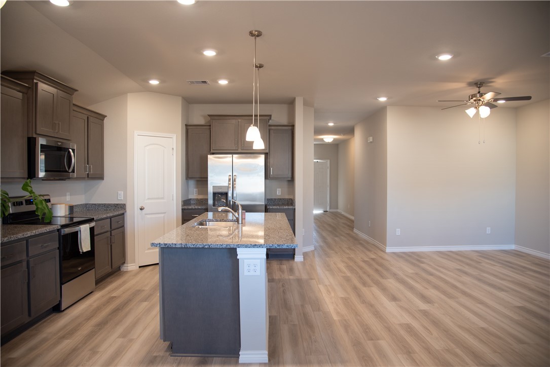2145 Chief Street Bryan, TX 77807 - Photo 5 of 22 Kitchen/Living Room