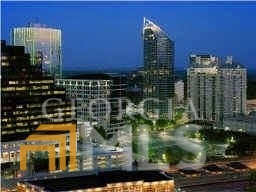 a view of a city with tall buildings