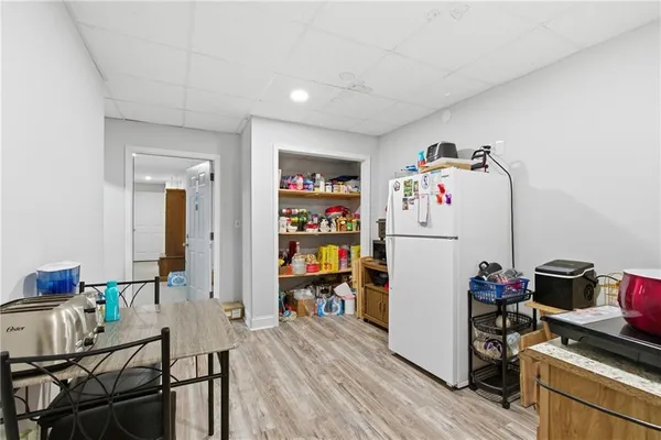 a room with furniture and wooden floor