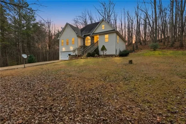 a house with trees in front of it