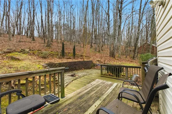 a view of a balcony with chairs