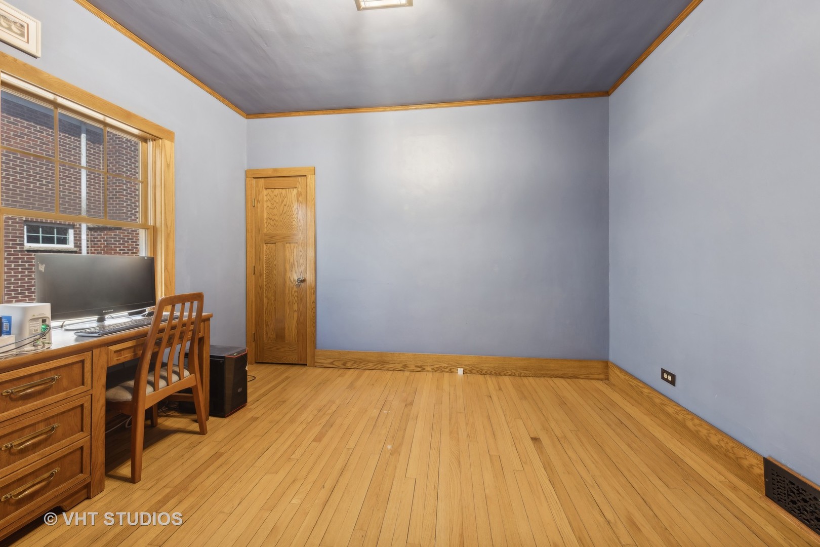 155 Geneva Avenue Elmhurst, IL 60126 - Photo 16 of 33 a view of a room with wooden floor