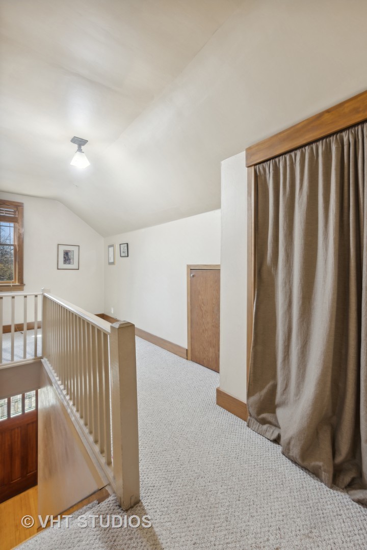 155 Geneva Avenue Elmhurst, IL 60126 - Photo 17 of 33 a view of a hallway with staircase