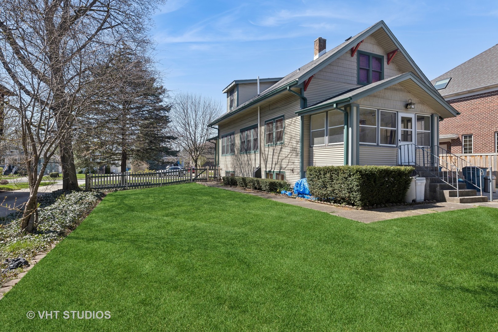 155 Geneva Avenue Elmhurst, IL 60126 - Photo 28 of 33 a front view of a house with a yard and trees