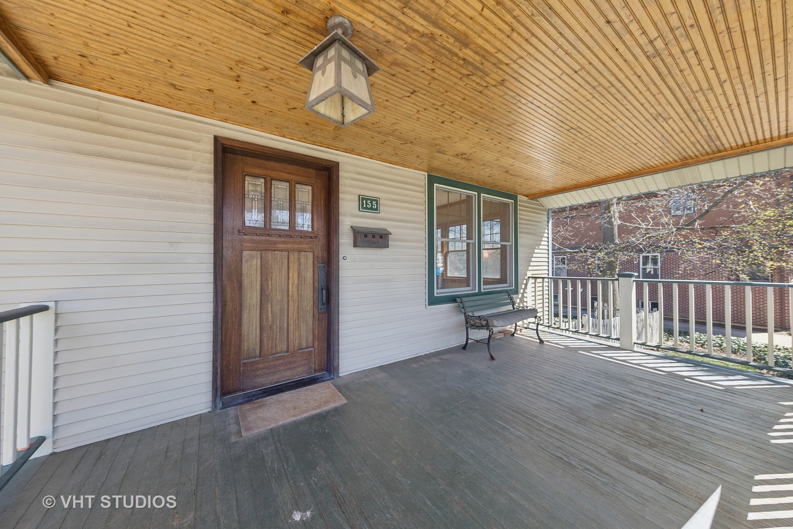 155 Geneva Avenue Elmhurst, IL 60126 - Photo 3 of 33 an empty room with wooden floor and windows