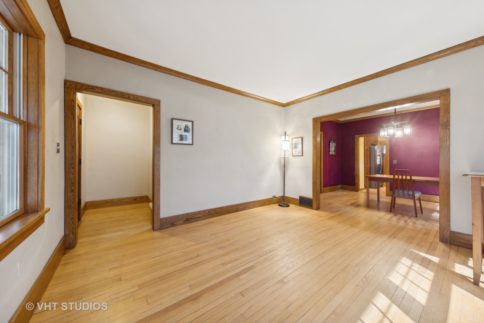 155 Geneva Avenue Elmhurst, IL 60126 - Photo 5 of 33 a view of a livingroom with wooden floor and dining room