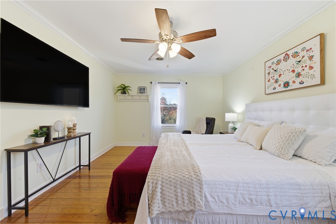 7471 Shoreline Drive Quinton, VA 23141 - Photo 24 of 45 a bedroom with a bed and a flat screen tv