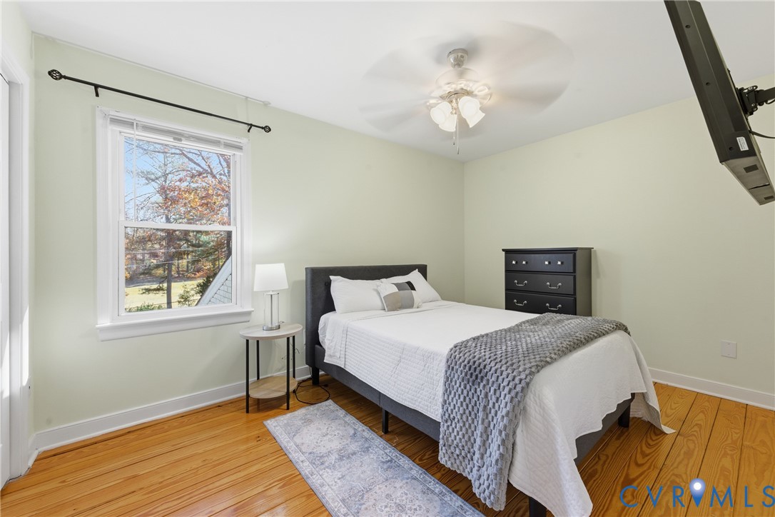 7471 Shoreline Drive Quinton, VA 23141 - Photo 27 of 45 a bedroom with a bed and a window