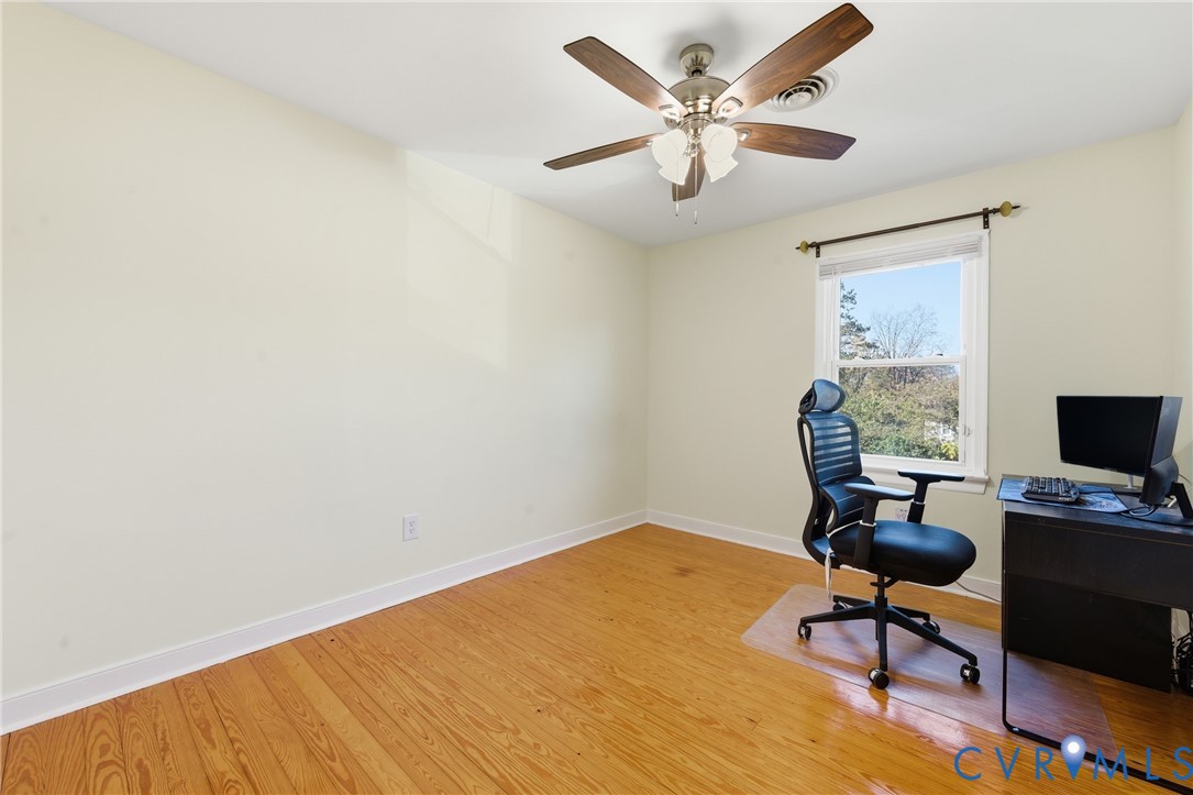 7471 Shoreline Drive Quinton, VA 23141 - Photo 28 of 45 a view of a workspace with furniture and a window