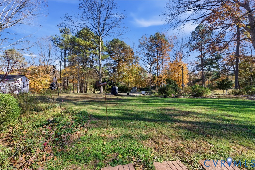 7471 Shoreline Drive Quinton, VA 23141 - Photo 37 of 45 a garden view with large trees