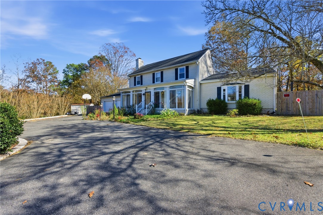 7471 Shoreline Drive Quinton, VA 23141 - Photo 4 of 45 a view of a house with a yard