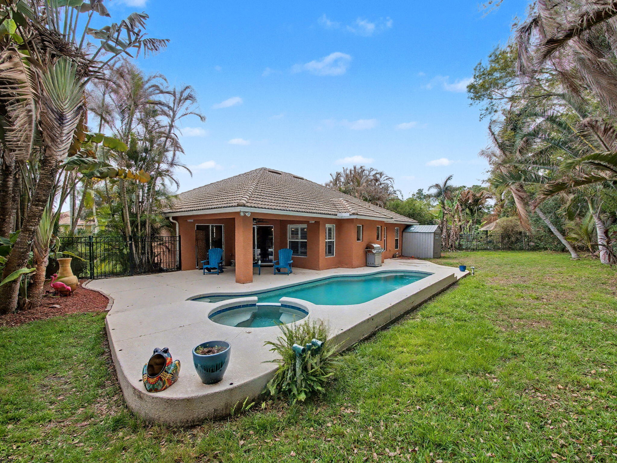 2041 Southwest Panther Trace Stuart, FL 34997 - Photo 27 of 33 Pool and Yard