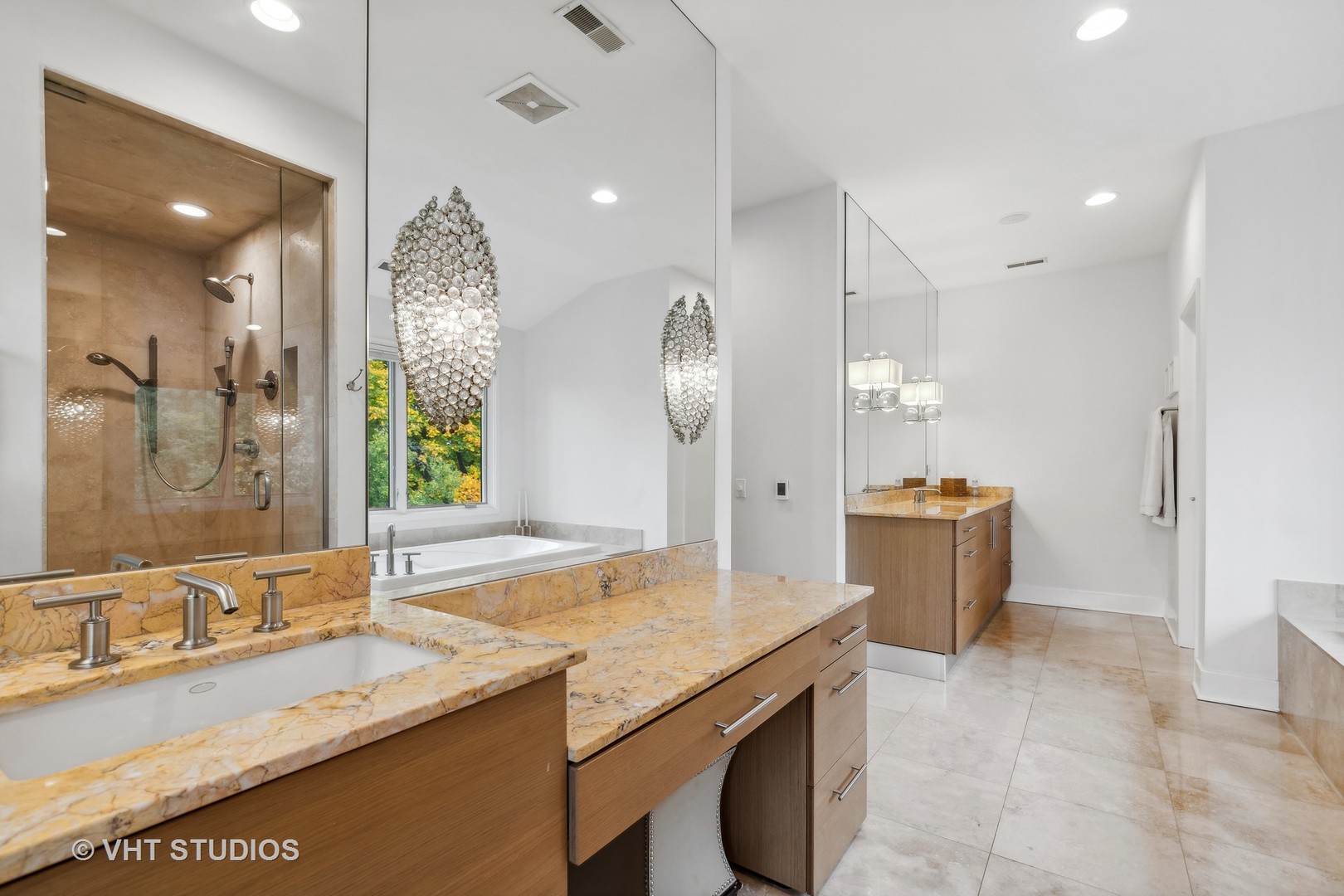 Undisclosed Address Highland Park, IL 60035 - Photo 16 of 32 a bathroom with a granite countertop sink a toilet and a mirror