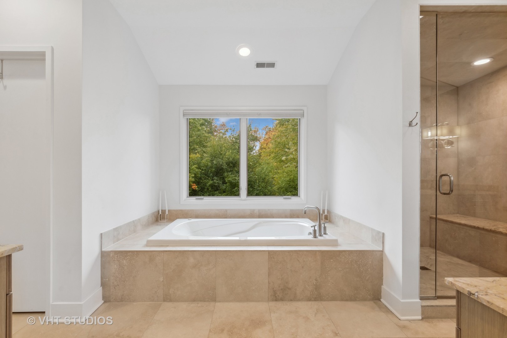 Undisclosed Address Highland Park, IL 60035 - Photo 17 of 32 a bathroom with a tub and shower
