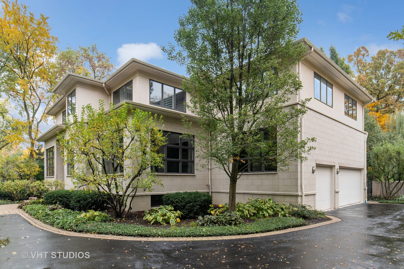 Undisclosed Address Highland Park, IL 60035 - Photo 2 of 32 a front view of a house with a yard