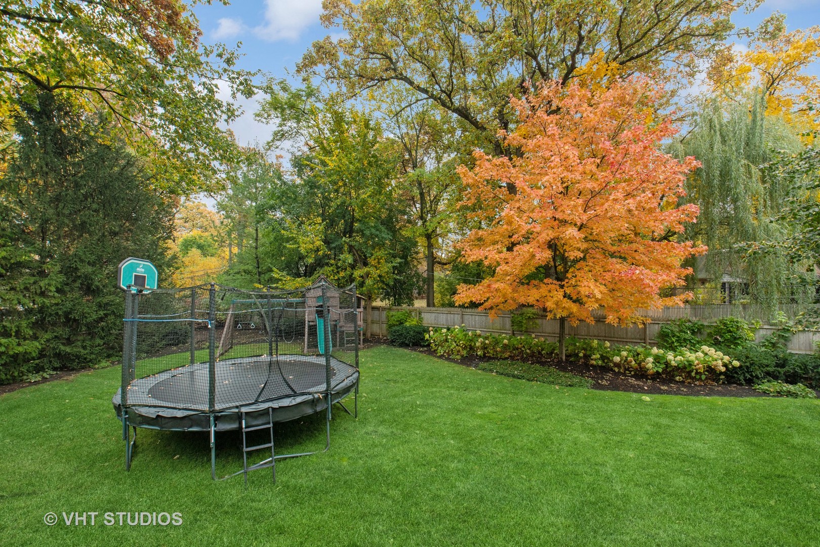 Undisclosed Address Highland Park, IL 60035 - Photo 28 of 32 a view of a backyard with a garden and entertaining space