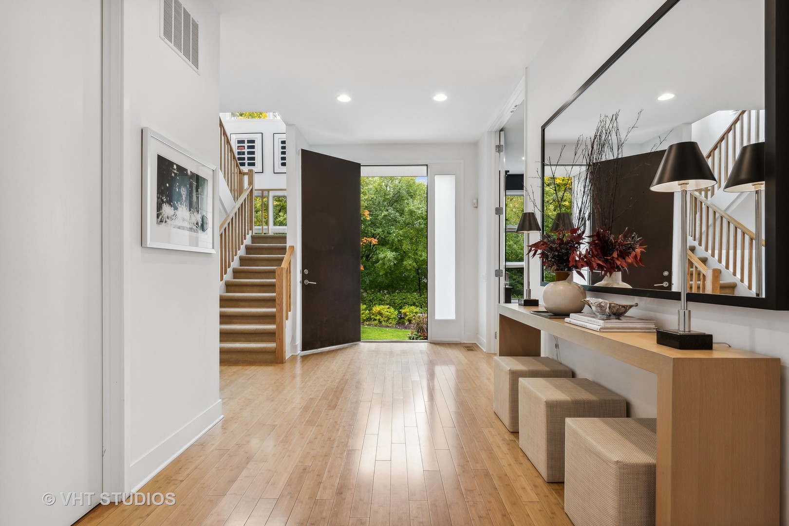 Undisclosed Address Highland Park, IL 60035 - Photo 3 of 32 a view of an entryway with wooden floor