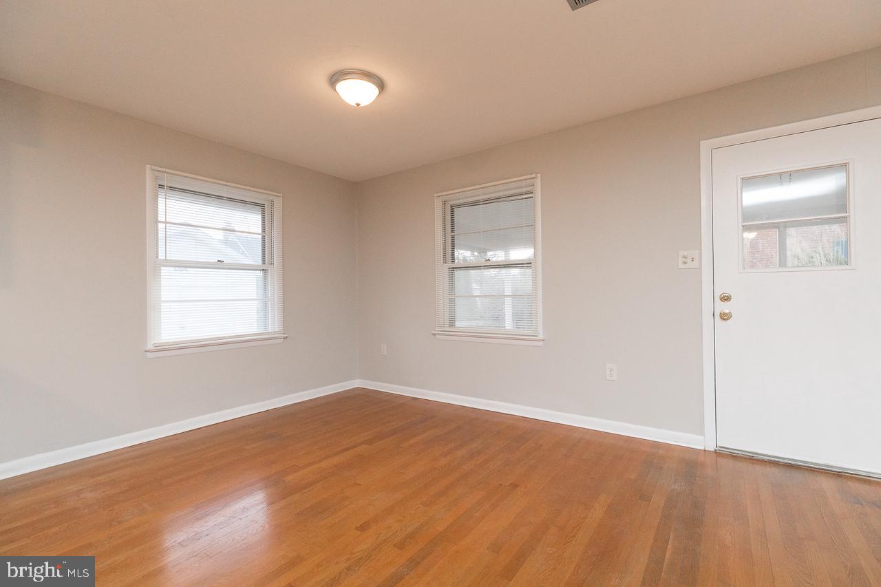 328 Russelcroft Road Winchester, VA 22601 - Photo 13 of 42 Dining room with side door & windows