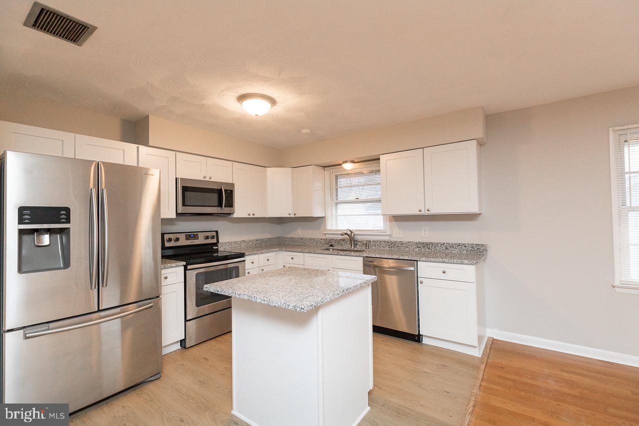328 Russelcroft Road Winchester, VA 22601 - Photo 8 of 42 Stainless steel appliances & an island
