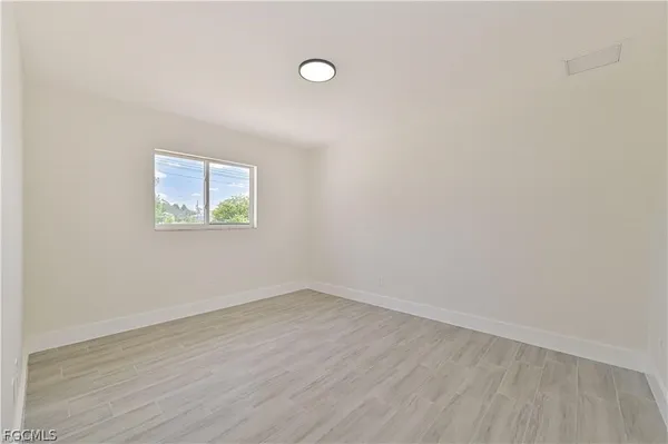 an empty room with a window