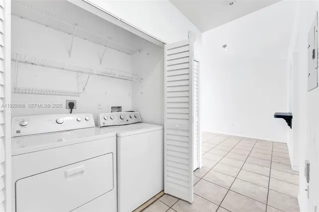 a view of utility room with washer and dryer