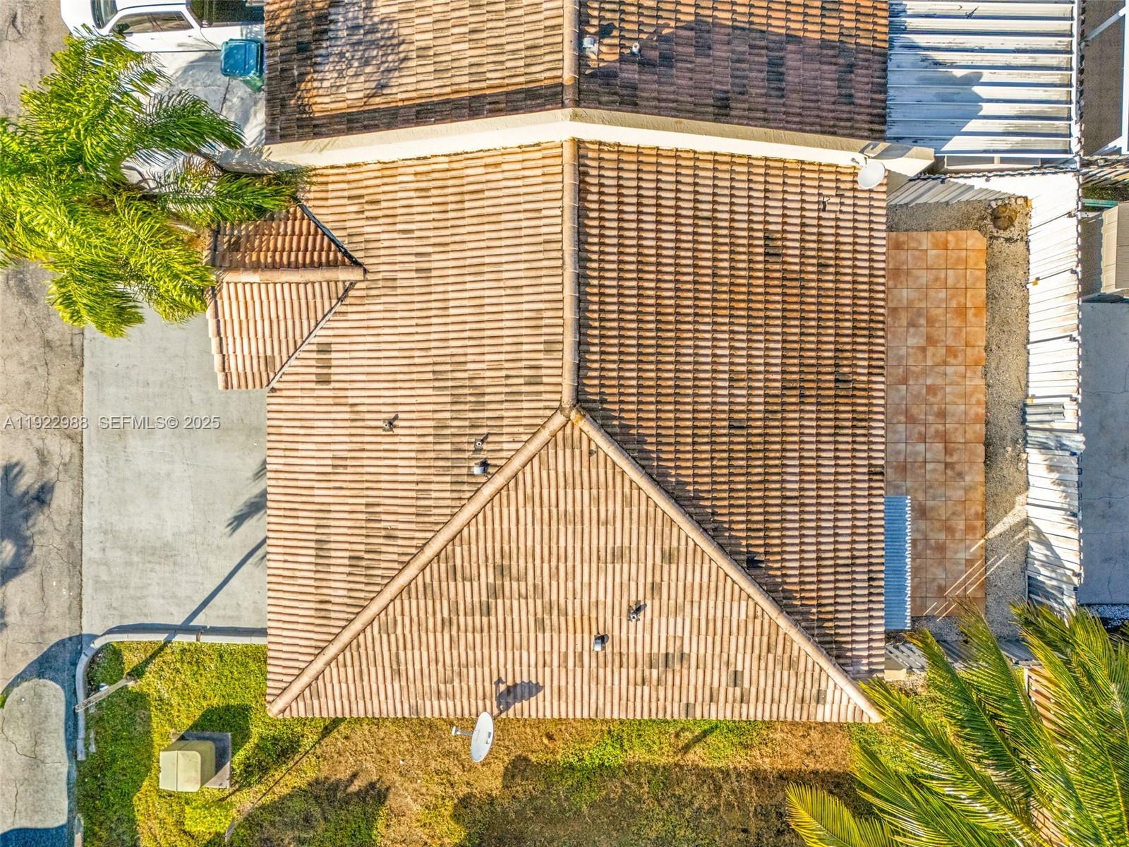 7665 Northwest 183rd Terrace, Unit 1405 Hialeah, FL 33015 - Photo 22 of 26 a view of wooden building