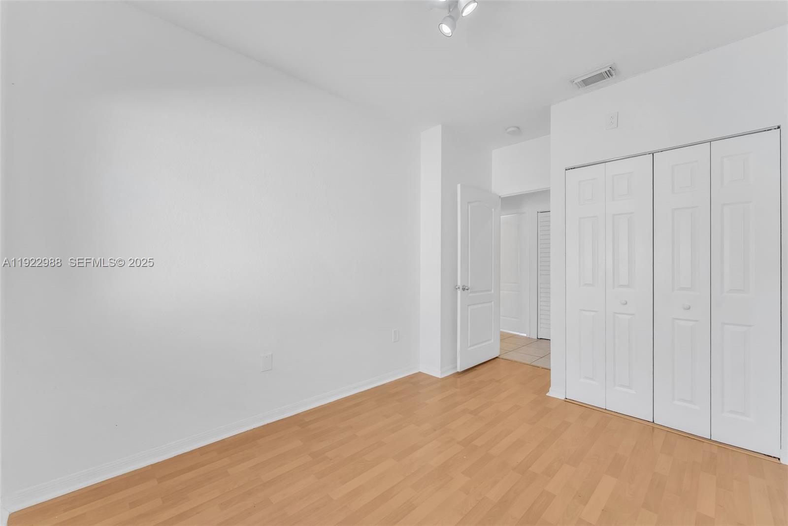 7665 Northwest 183rd Terrace, Unit 1405 Hialeah, FL 33015 - Photo 9 of 26 a view of an empty room