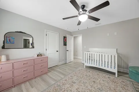 a bathroom with a double vanity sink and mirror