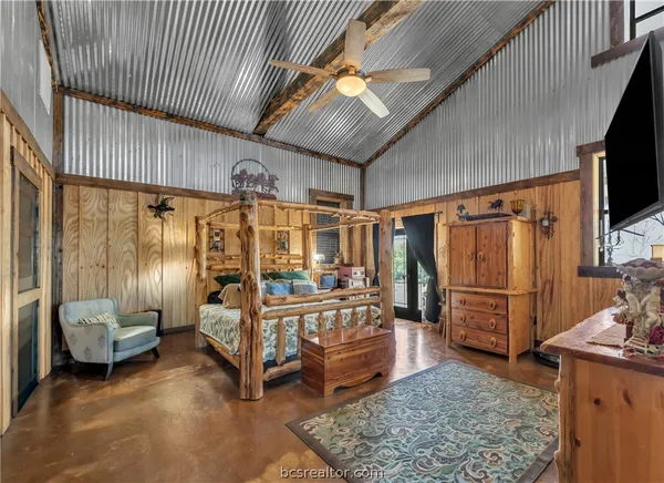a kitchen with sink a refrigerator and cabinets