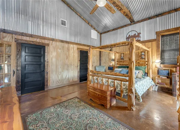 a view of a backyard with a garden and plants