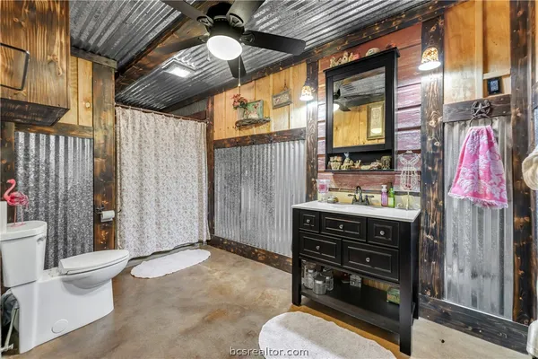 a view of a yard with trees in front of it