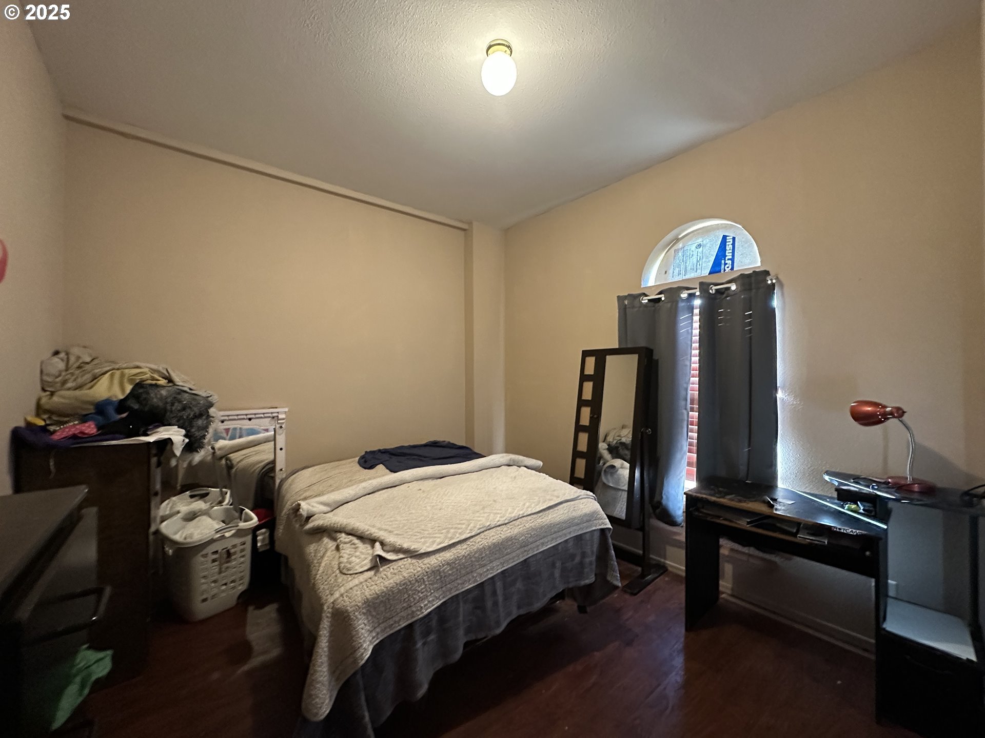 22 Glen Affric Road Goldendale, WA 98620 - Photo 12 of 19 a bed sitting in a bedroom next to a window
