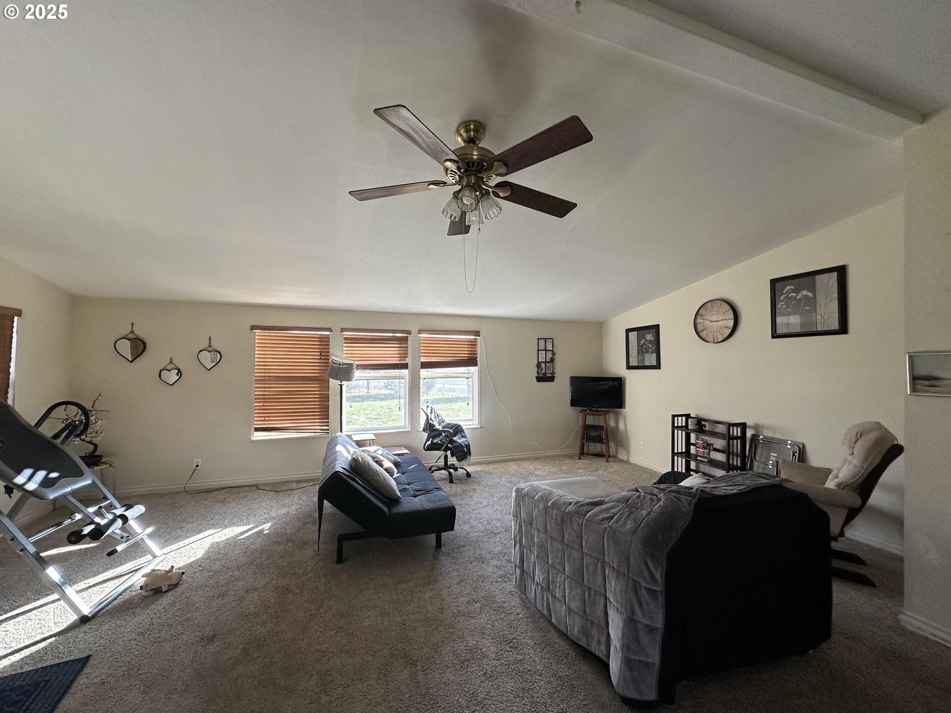 22 Glen Affric Road Goldendale, WA 98620 - Photo 2 of 19 a bedroom with furniture and a large window