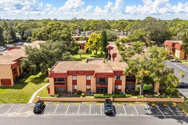 a view of multiple houses with a street