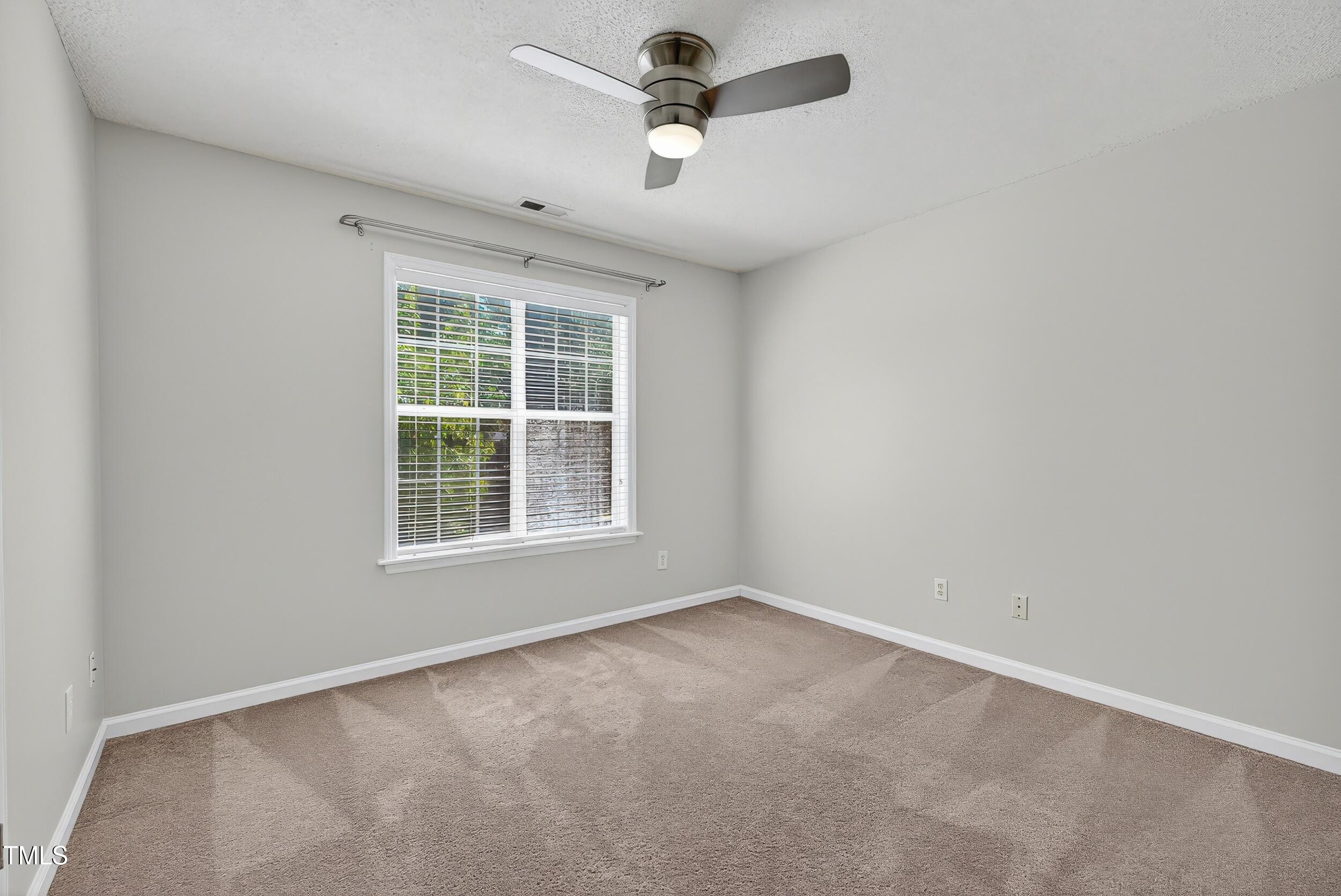 532 Baygall Road Holly Springs, NC 27540 - Photo 11 of 15 an empty room with a window