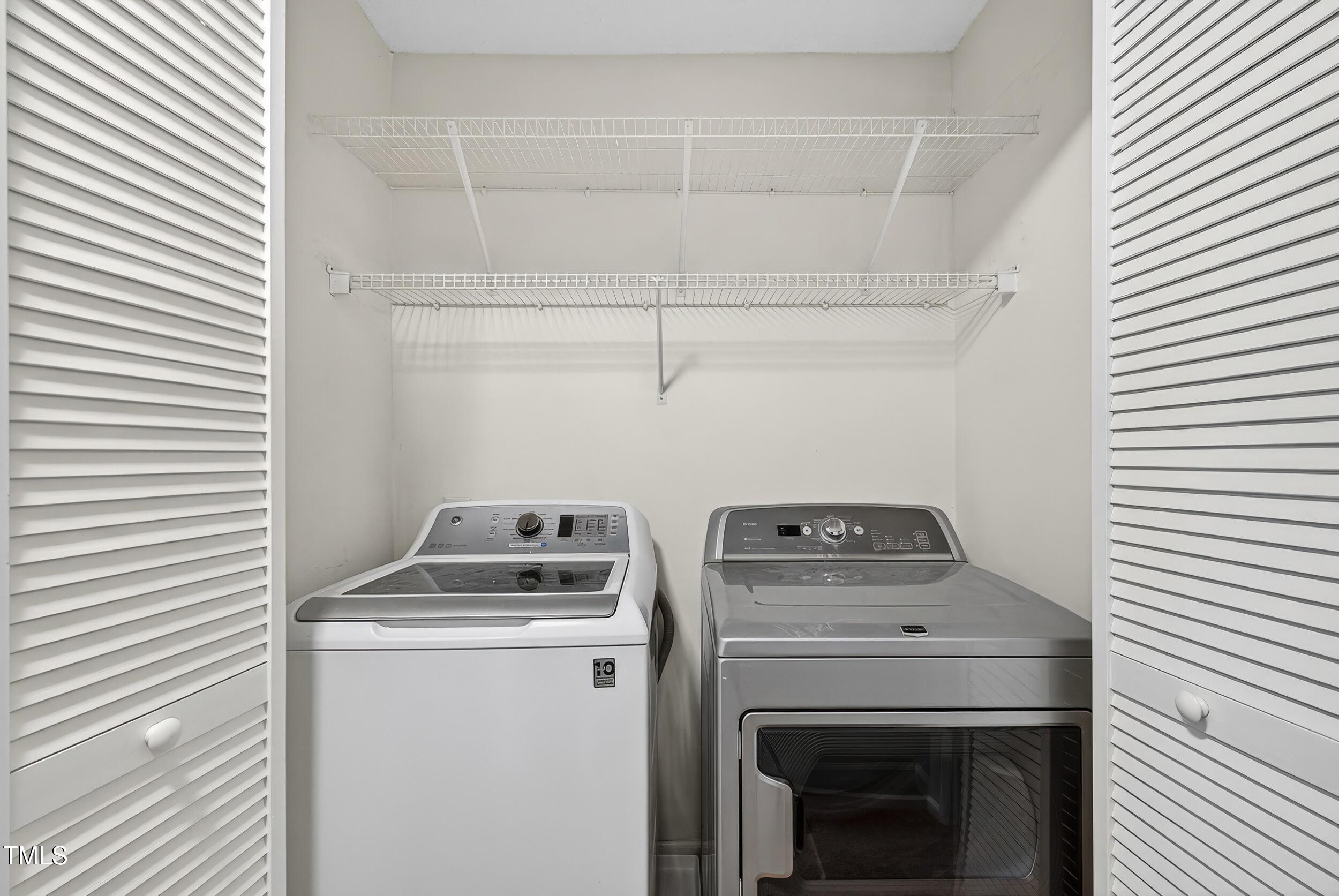 532 Baygall Road Holly Springs, NC 27540 - Photo 14 of 15 a utility room with dryer and washer