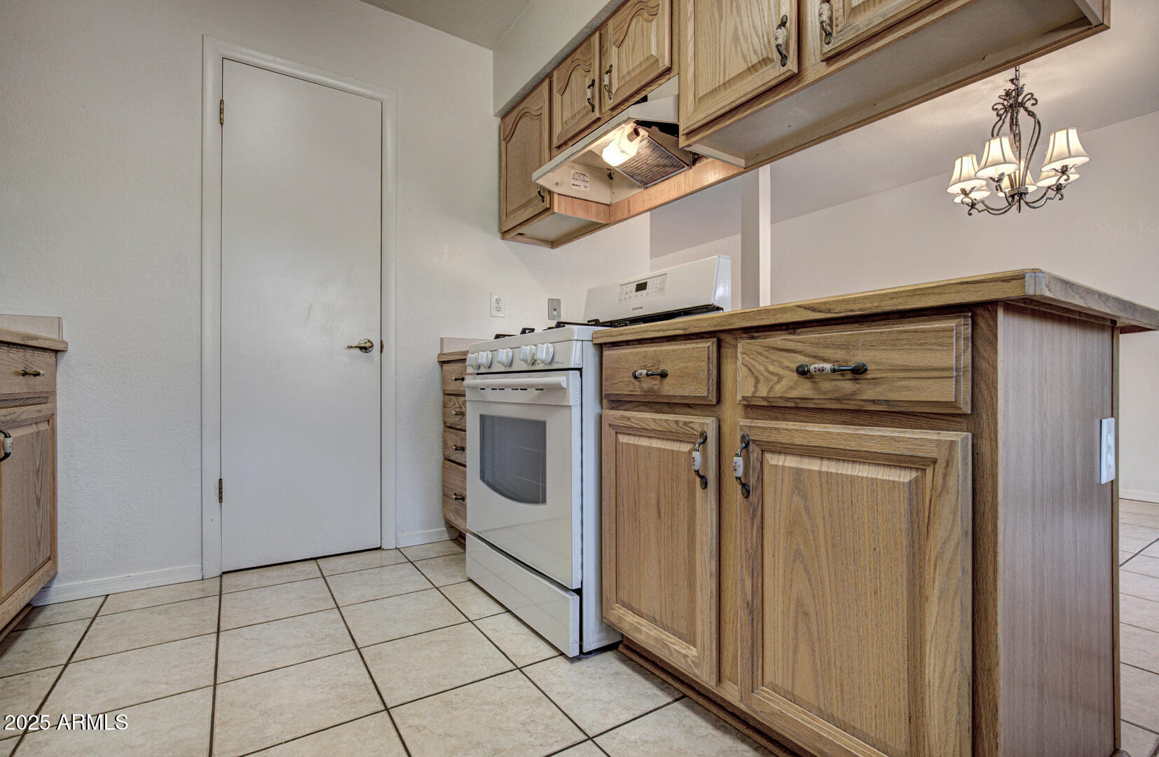 508 South Meadow Street Payson, AZ 85541 - Photo 7 of 29 a utility room with cabinets dryer and washer