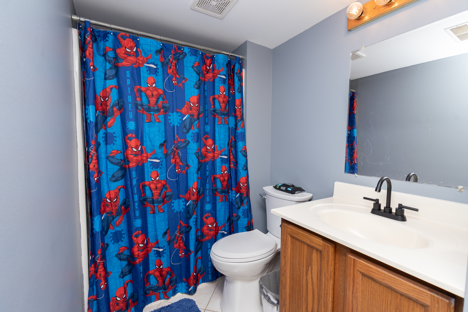 4002 Ridge Road Zion, IL 60099 - Photo 17 of 20 a bathroom with a sink and a toilet