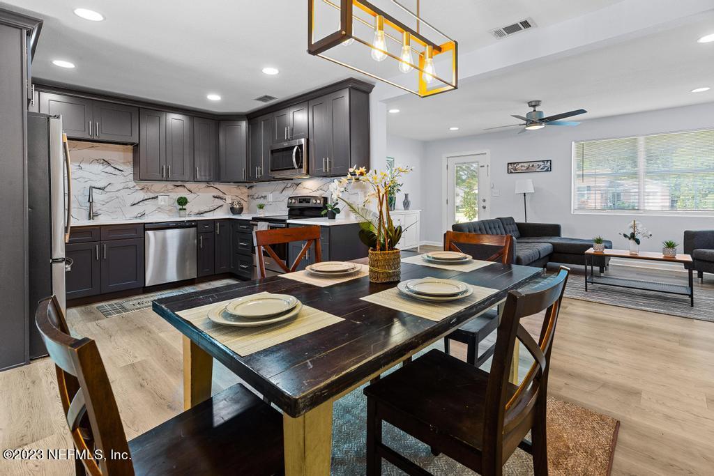 1505 Glengarry Road Jacksonville, FL 32207 - Photo 28 of 65 a view of a dining room with furniture