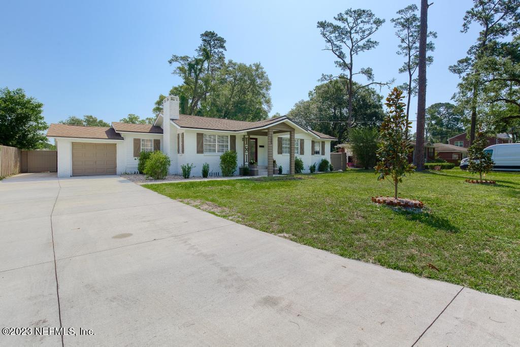 1505 Glengarry Road Jacksonville, FL 32207 - Photo 4 of 65 a view of a house with a yard and tree s