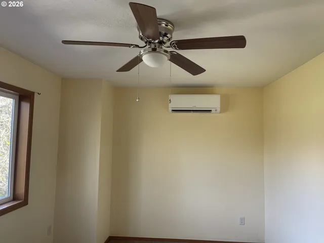 a view of house with yard