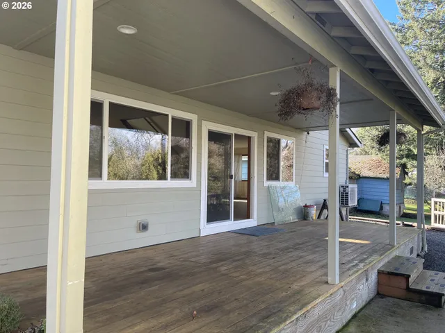 a view of a house with a back yard