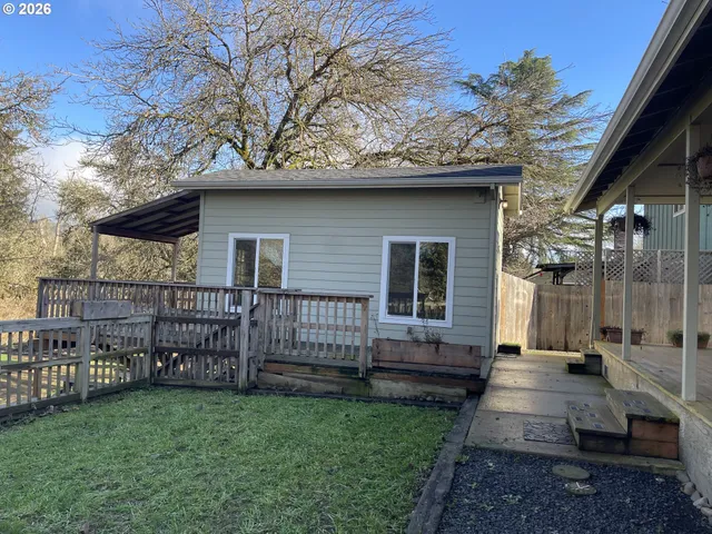 a view of a wooden fence