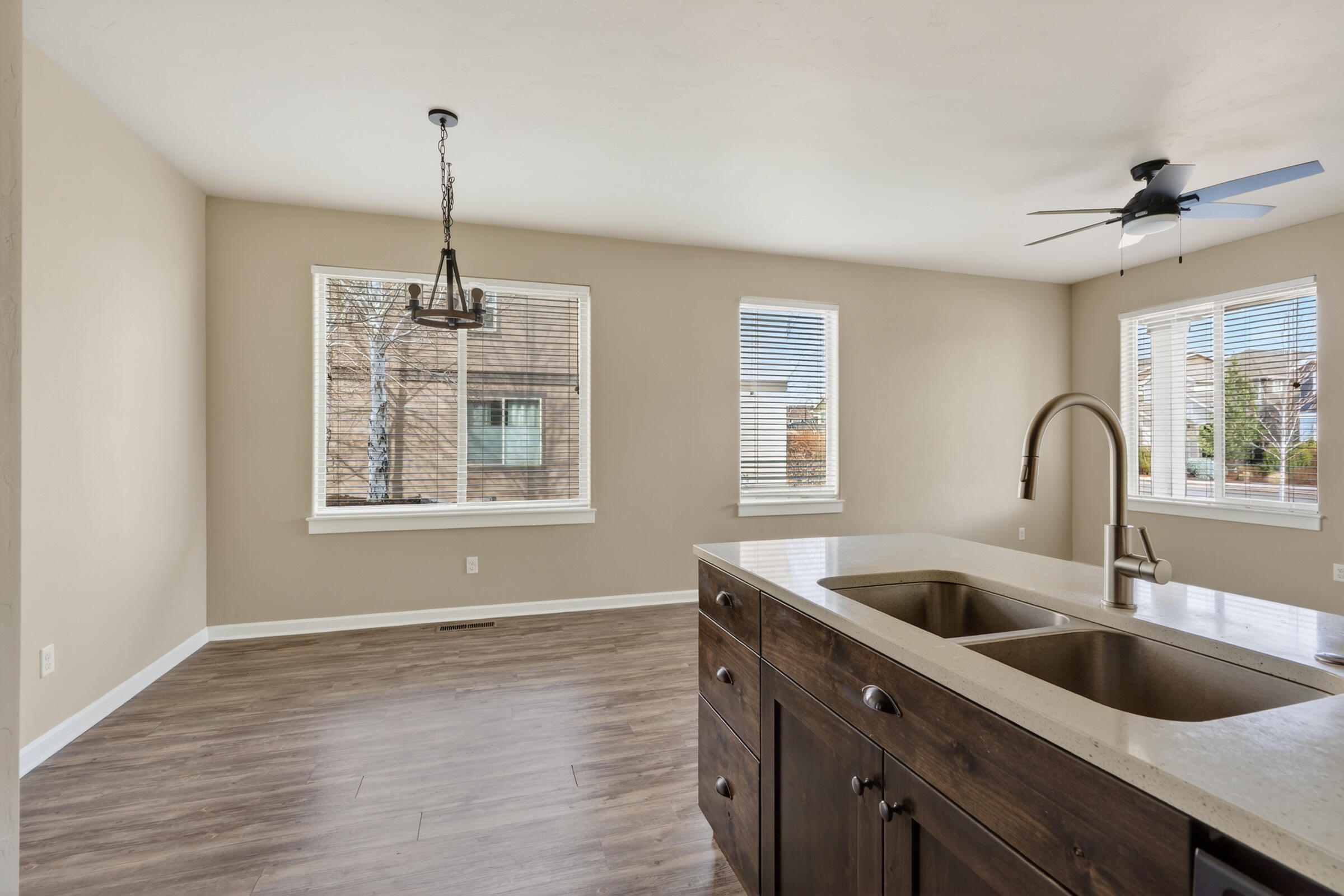 3365 Southwest 28th Street Redmond, OR 97756 - Photo 9 of 39 a kitchen with a sink and chandelier