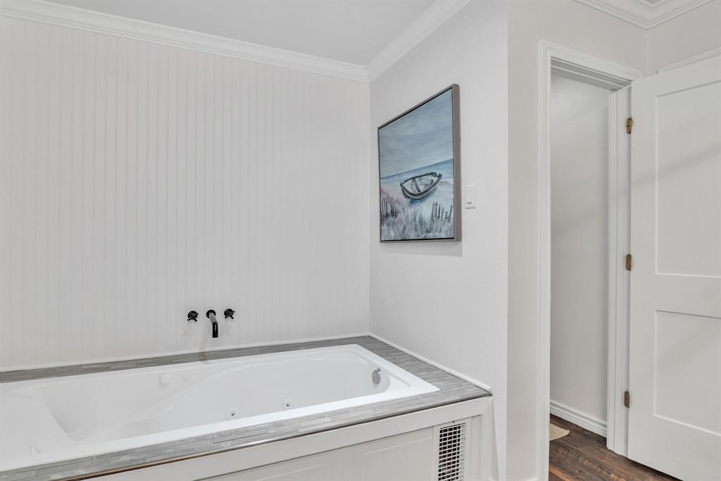 860 County Road 1627 Rusk, TX 75785 - Photo 14 of 37 a bathroom with a bathtub and shower